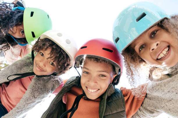 son wearing bike helmet