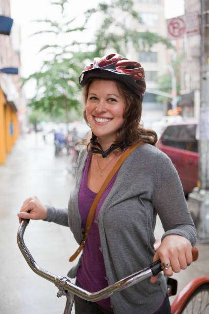 Riding a bike while wearing a bike helmet