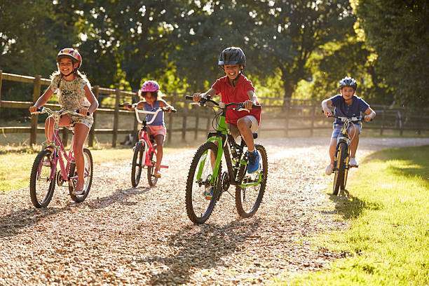 Happy mountain bike couple outdoors bike helmet